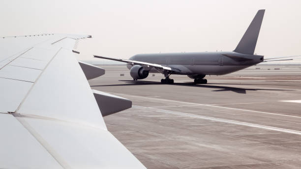 istock Passenger airplane in airport. View from plane window 866738798
