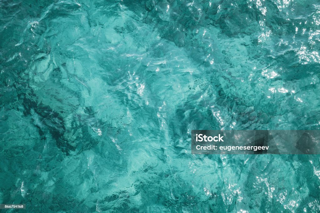Blue ocean water surface, background photo Blue ocean water surface, background photo texture, top view Sea Stock Photo
