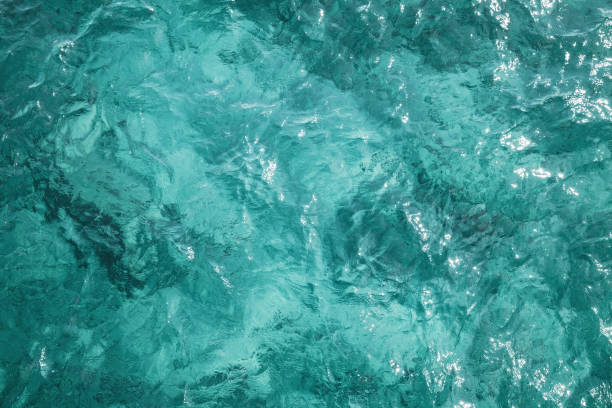 blue ocean water surface, background photo - sea texture imagens e fotografias de stock