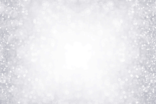Elegant silver and white glitter sparkle confetti background border for happy birthday, anniversary, winter, Christmas or wedding party invite