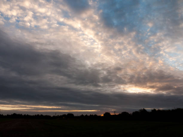 istock glowing stunning dramatic morning cloudy blue sky overhead space 866756658