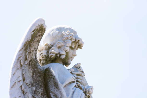 istock Angel, old marble statue, sky background with copy space 866761360