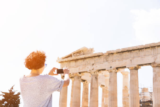 istock Tourists taking selfie in front of Acropolis in Greece 866764126
