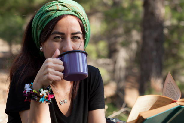 istock woman at camping 866771162