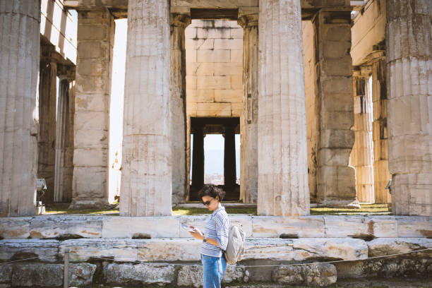 Young woman visiting Ancient Agora of Athens