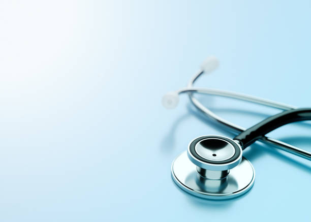 Stethoscope on Blue Background Healthcare Stethoscope Blue Background Medical stethoscope photos stock pictures, royalty-free photos & images
