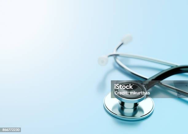 Stethoscope On Blue Background Stock Photo - Download Image Now - Stethoscope, Healthcare And Medicine, Doctor