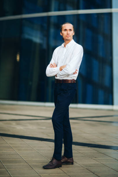 istock Elegant businessman talking phone 866782996