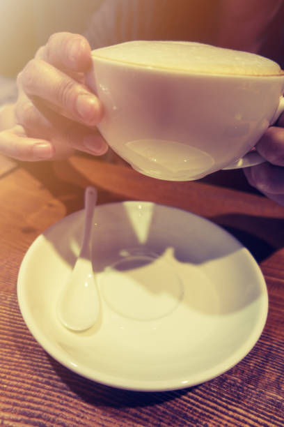 istock Close-up Hands Holding a Cup of Coffee 866799710