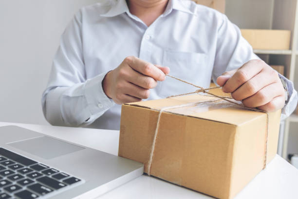 istock Internet online shopping concept, Young seller man preparing package to be sent Mail transportation, service network connection market, technology on global, Order online for customer convenience 866800030