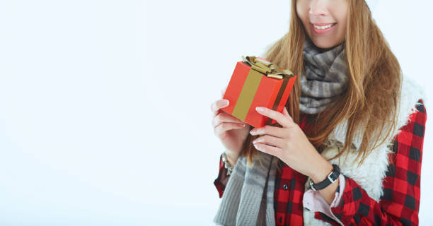 istock Portrait happy woman with gift box in hands. 866803318