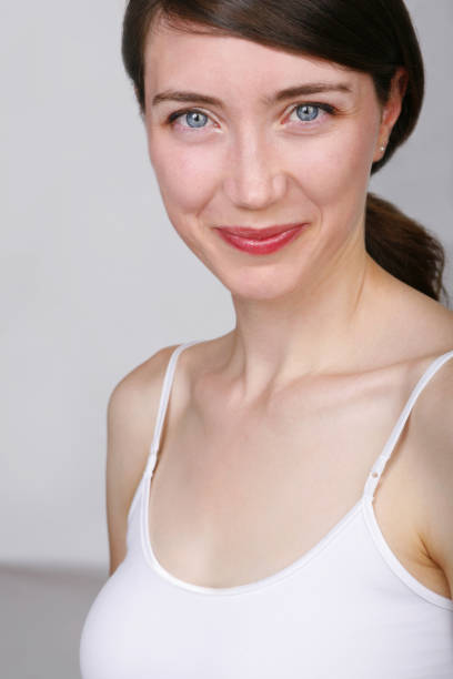 istock Studio portrait of beautiful young woman. 866807032