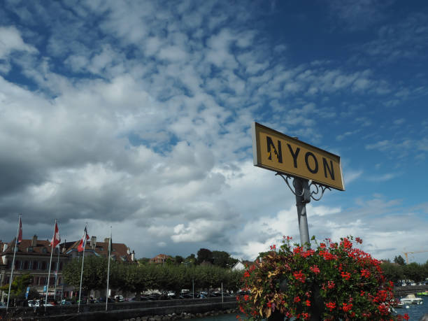 istock Nyon city sign at boat pier 866814522