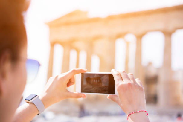 istock Tourists taking selfie in front of Acropolis in Greece 866819854