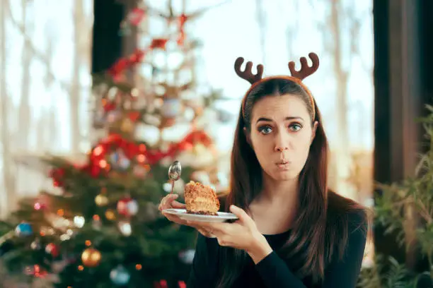 Photo of Picky Girl Hating The Cake at Christmas Dinner Party
