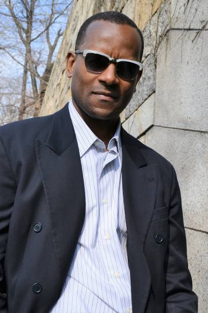 istock Model wearing a suit jacket, collared dress shirt and shades (Full Color) 866825546