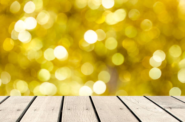 istock Wood table top Bokeh gold 866830864