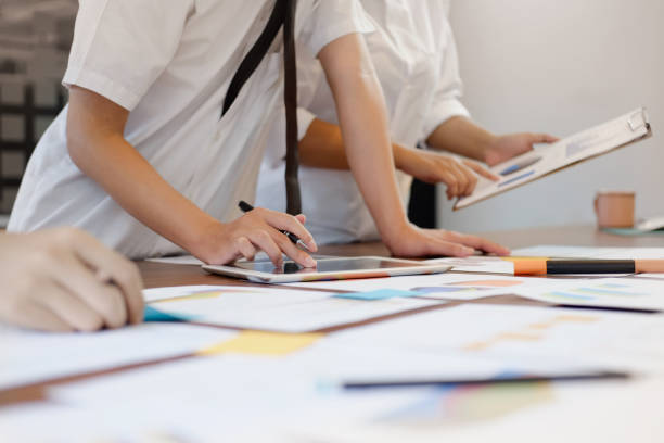 istock Start up launch business Ideas growth success concept. Businessman determine Ideas planning with documents working Concept. 866841956