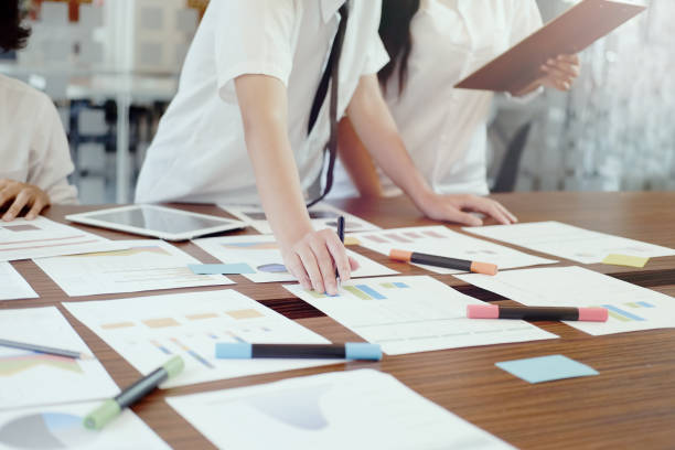 istock Start up launch business Ideas growth success concept. Businessman determine Ideas planning with documents working Concept. 866842088