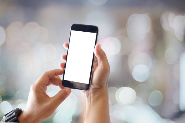 istock Mockup smartphone blank screen in man hands over blurred background. 866842130