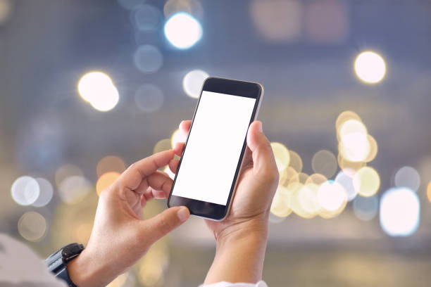 istock Mockup smartphone blank screen in man hands over blurred background. 866842212