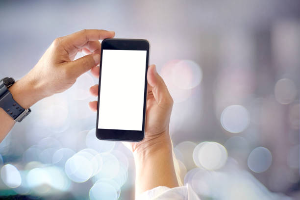 istock Mockup smartphone blank screen in man hands over blurred background. 866846612