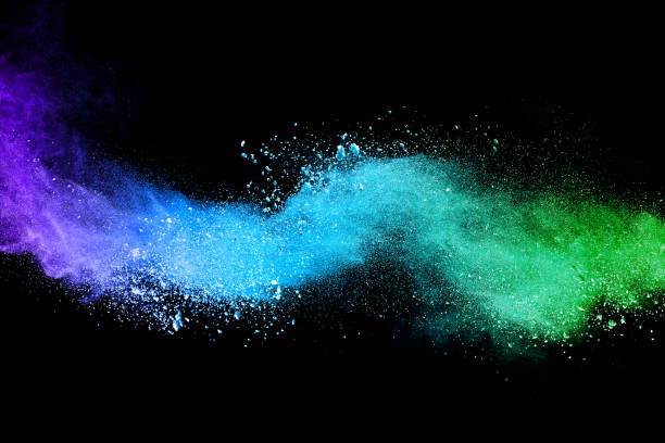 istock Freeze motion of colored powder explosions isolated on black background 866863072