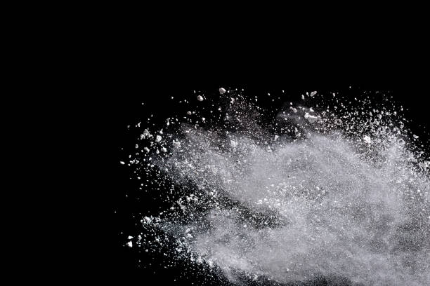 istock Freeze motion of white powder explosions isolated on black background 866863484