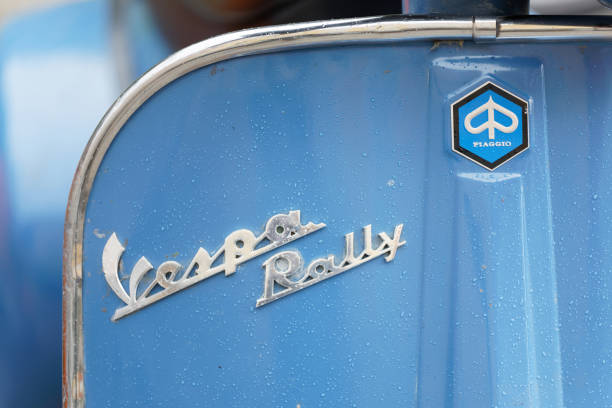 closeup of blue parked old fashioned classic vespa rally scooters at the mods vs rockers event - vespa scooter imagens e fotografias de stock