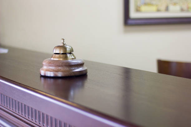 istock Service bell in a hotel reception for concierge alarm on desk. 866879332