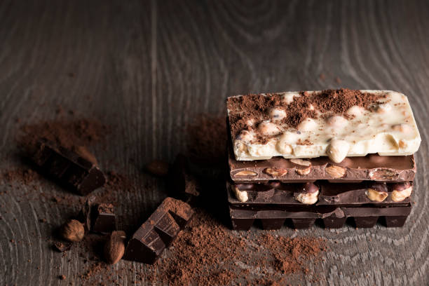istock Chocolate / Chocolate bar on dark wooden background 866879794