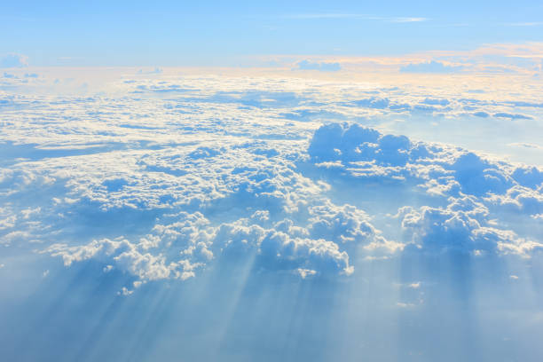 istock upper clouds view out of airplane - blue sky cloudscape 866882892