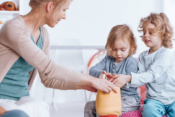 istock Kids playing blocks in kindergarten 866883598