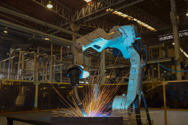 istock Robot is welding assembly automotive part 866887500