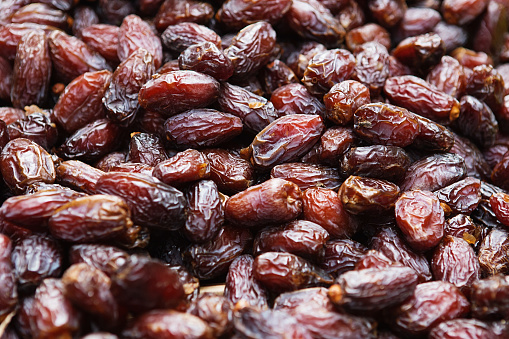 Background of dried dates fruit, at the open air market
