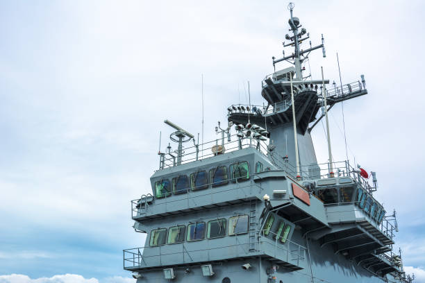 istock Radar system on the battleship with clear sky 866897800