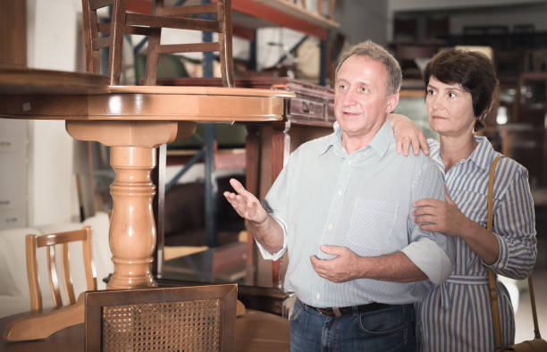 istock Mature couple is shopping the old table 866904818