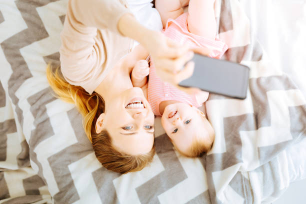 istock Funny relatives making photos together 866905464