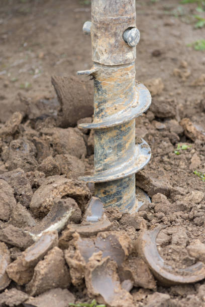 istock Construction machine for drilling holes in the ground 866908194