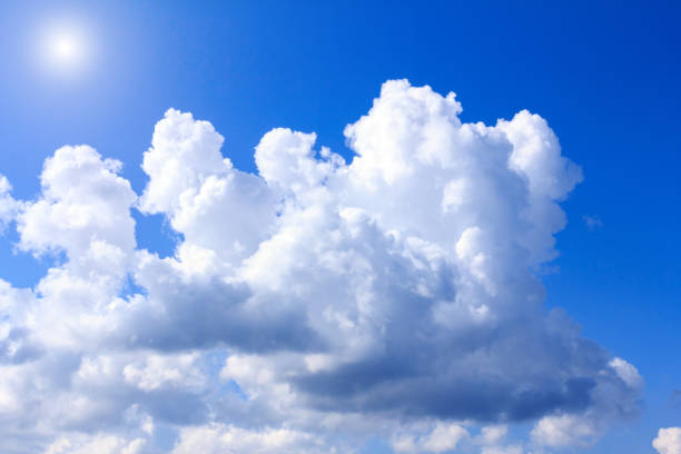 istock Blue sky with white clouds. rain clouds and sunshine on sunny summer or spring day. 866908480