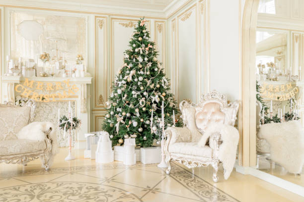 istock Christmas morning. classic apartments with a white fireplace, decorated tree, bright sofa, large windows 866908514