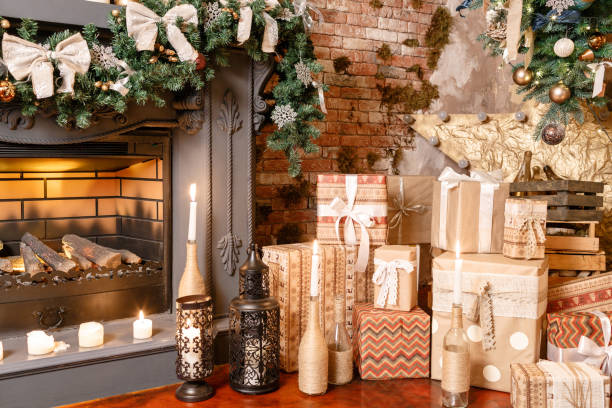 istock alternative tree upside down on the ceiling. Winter home decor. Christmas in loft interior against brick wall. 866910346