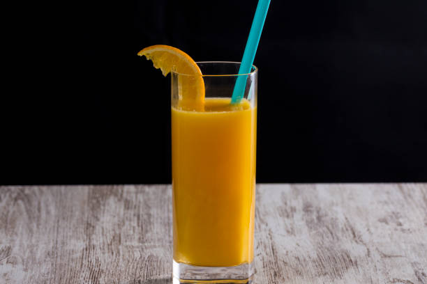 istock Glass of orange juice 866921280