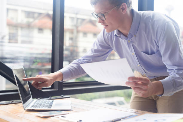 istock smart businessman work with laptop in office 866922322
