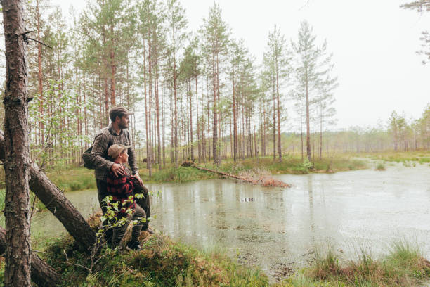 istock Father and son in nature together 866925524
