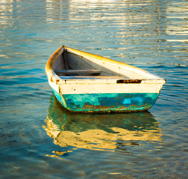 istock Old fishing boat at sunset 866926294