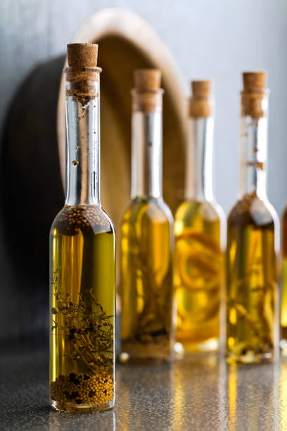 istock Olive oil with spices and herbs. 866928840