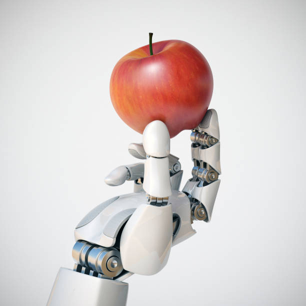 istock Robotic hand holding an apple 3d rendering, gmo concept, automation concept 866933184