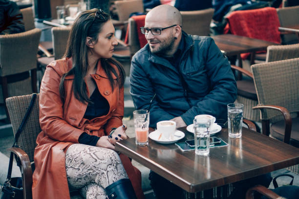 istock Couple in love drinking coffee in coffee shop 866933490