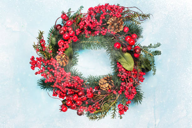istock Christmas wreath on wooden door 866936680